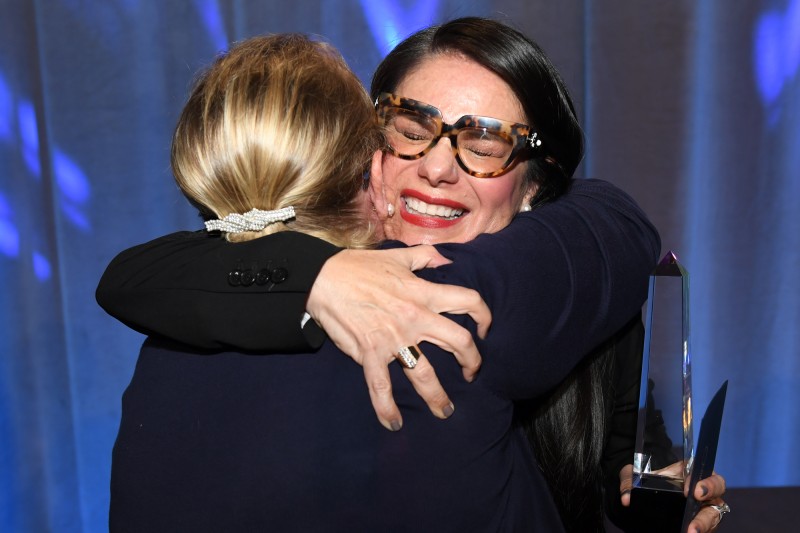 Araceli Montoya and Elzbieta Galek Share in a Congratulatory Hug