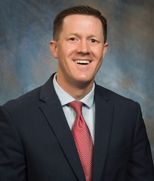 Dr.  Cade  Brumley 