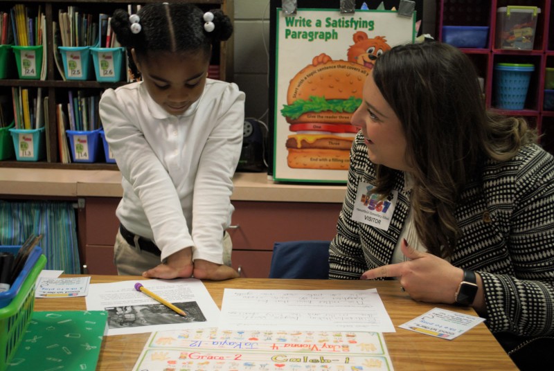 NIET Senior Program Specialist Lindsey Parker visits with students