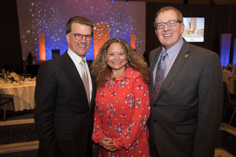 NIET Chairman Lowell Milken, Lowell Milken Center Fellow and Milken Educator Madeline Hanington, and Lowell Milken Center Executive Director Norm Conard